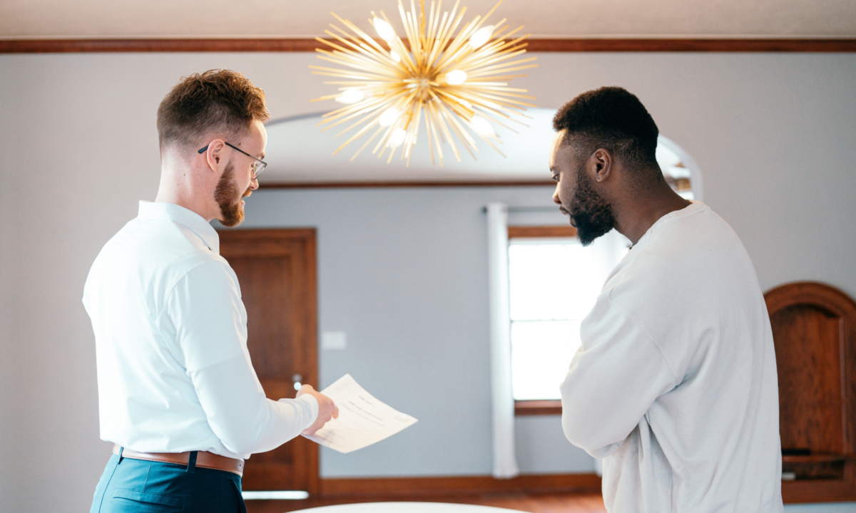 two agents discussing their real estate business plan