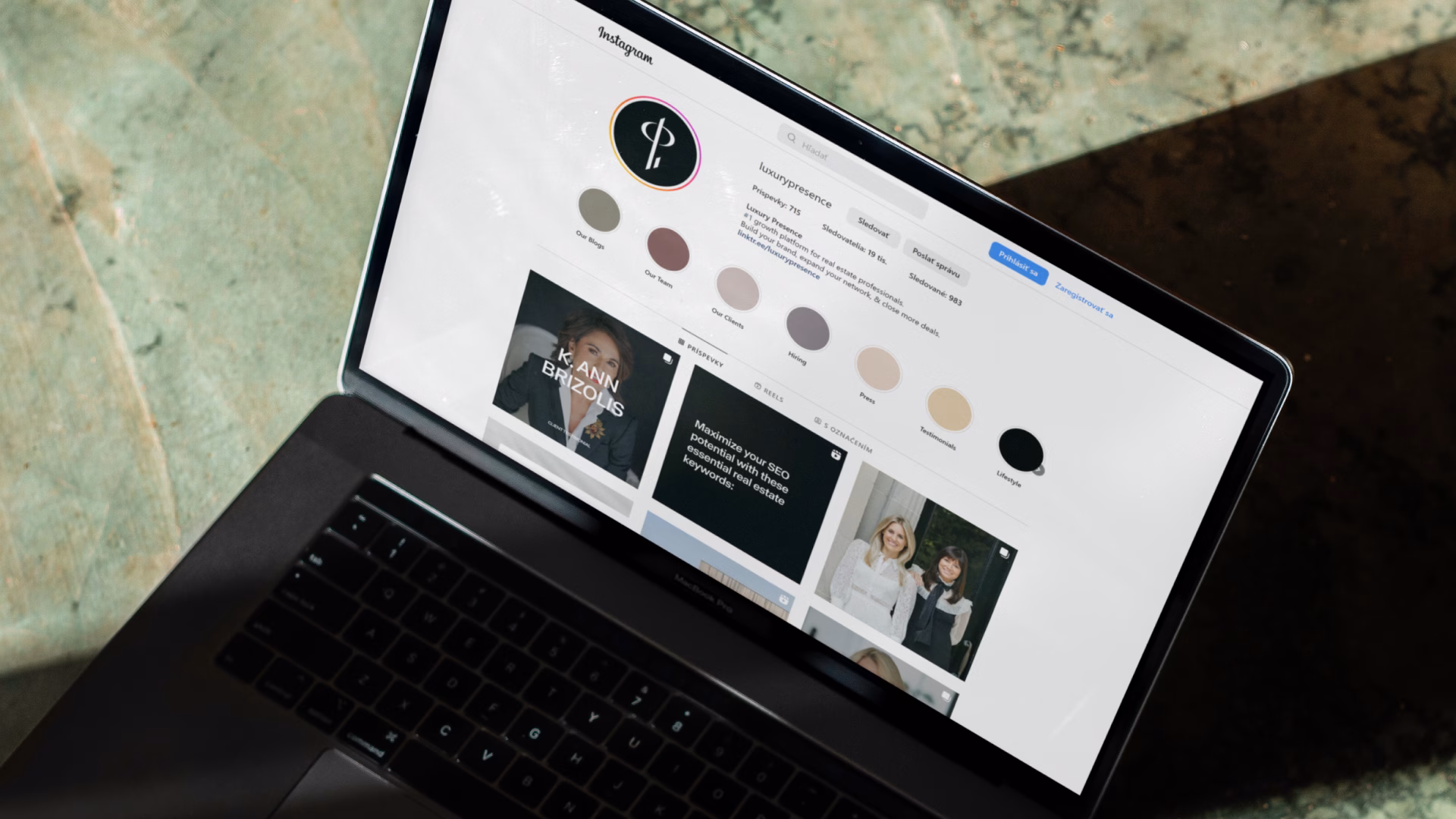 Laptop showing one of the top real estate instagram accounts on its screen