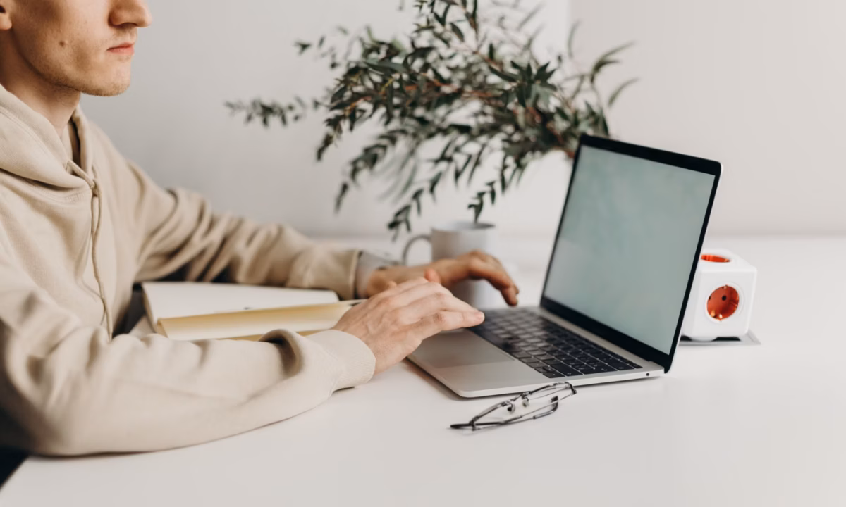 A realtor searches the internet for advice on how to write effectively for a real estate resource guide.