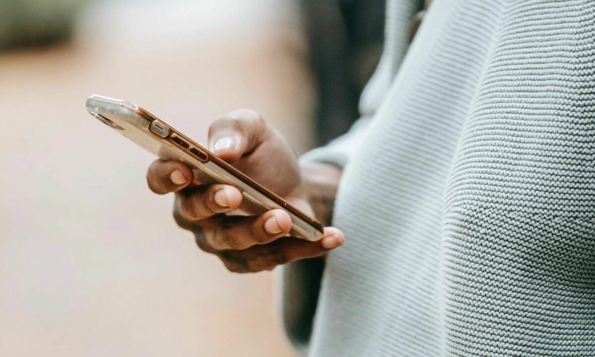 A customer is looking through his phone.