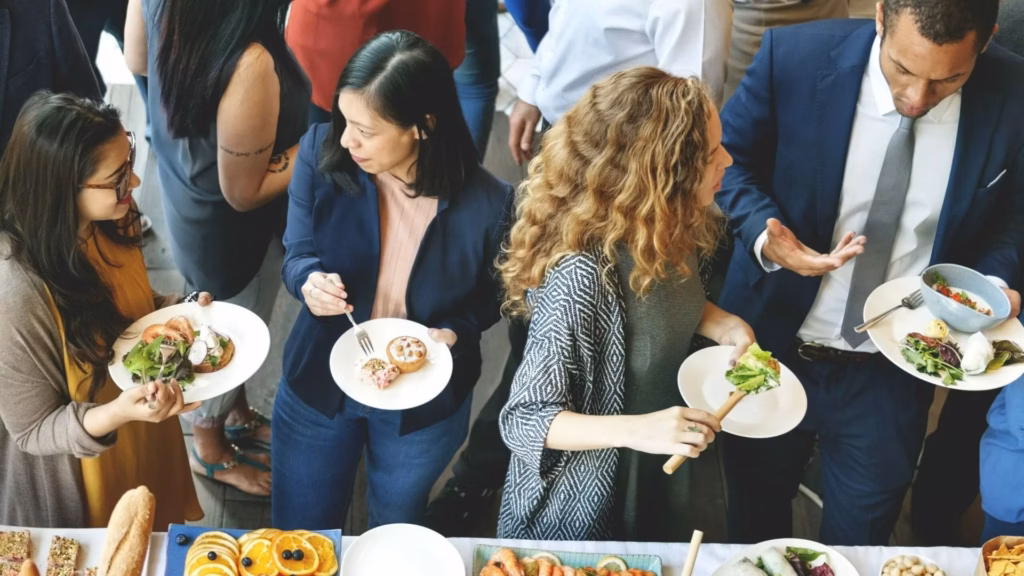 A group of real estate agents socializing in the community through a public event.