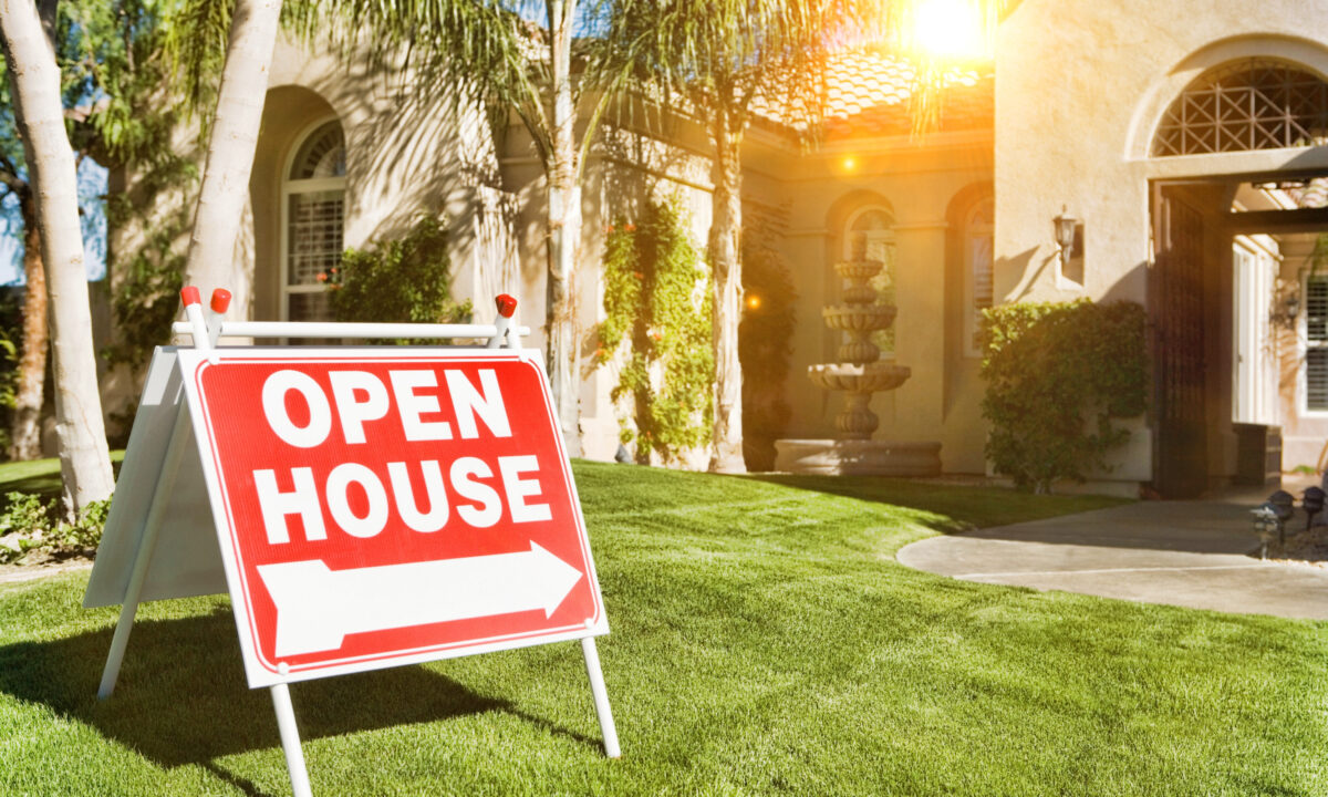 Eye-catching Open House sign outside stunning property as an example of one of nine real estate sign ideas