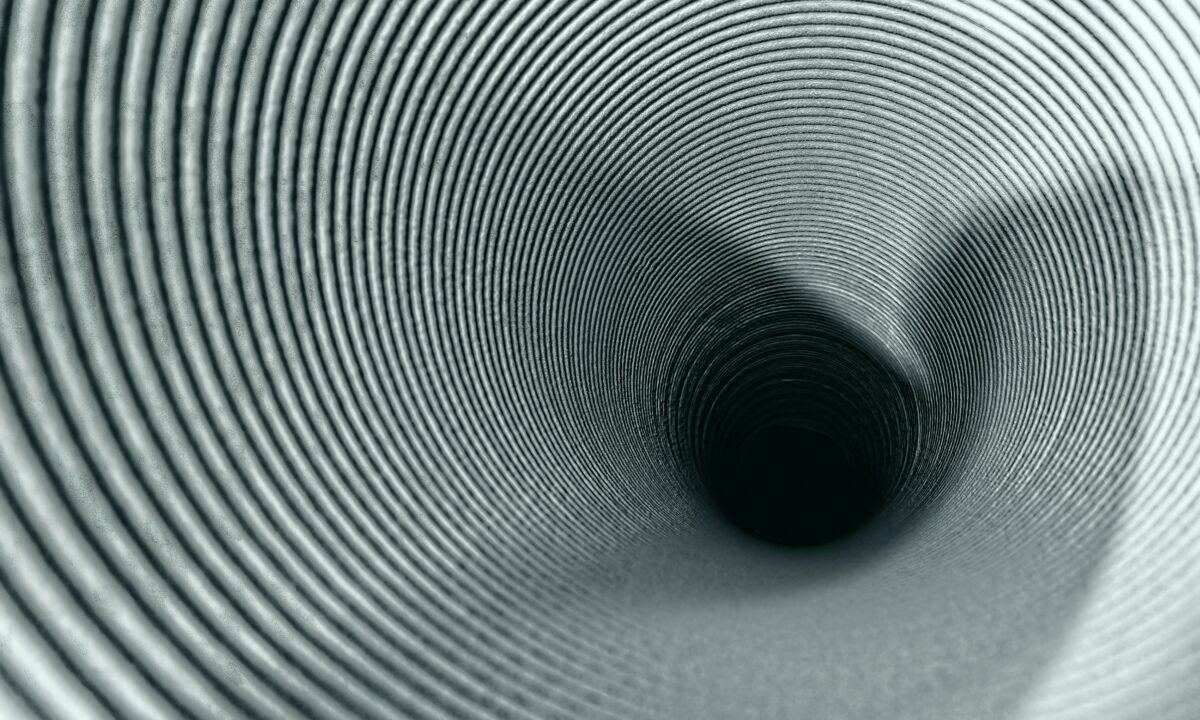 A black-and-white image of a tunnel used as a metaphor for a real estate marketing funnel.