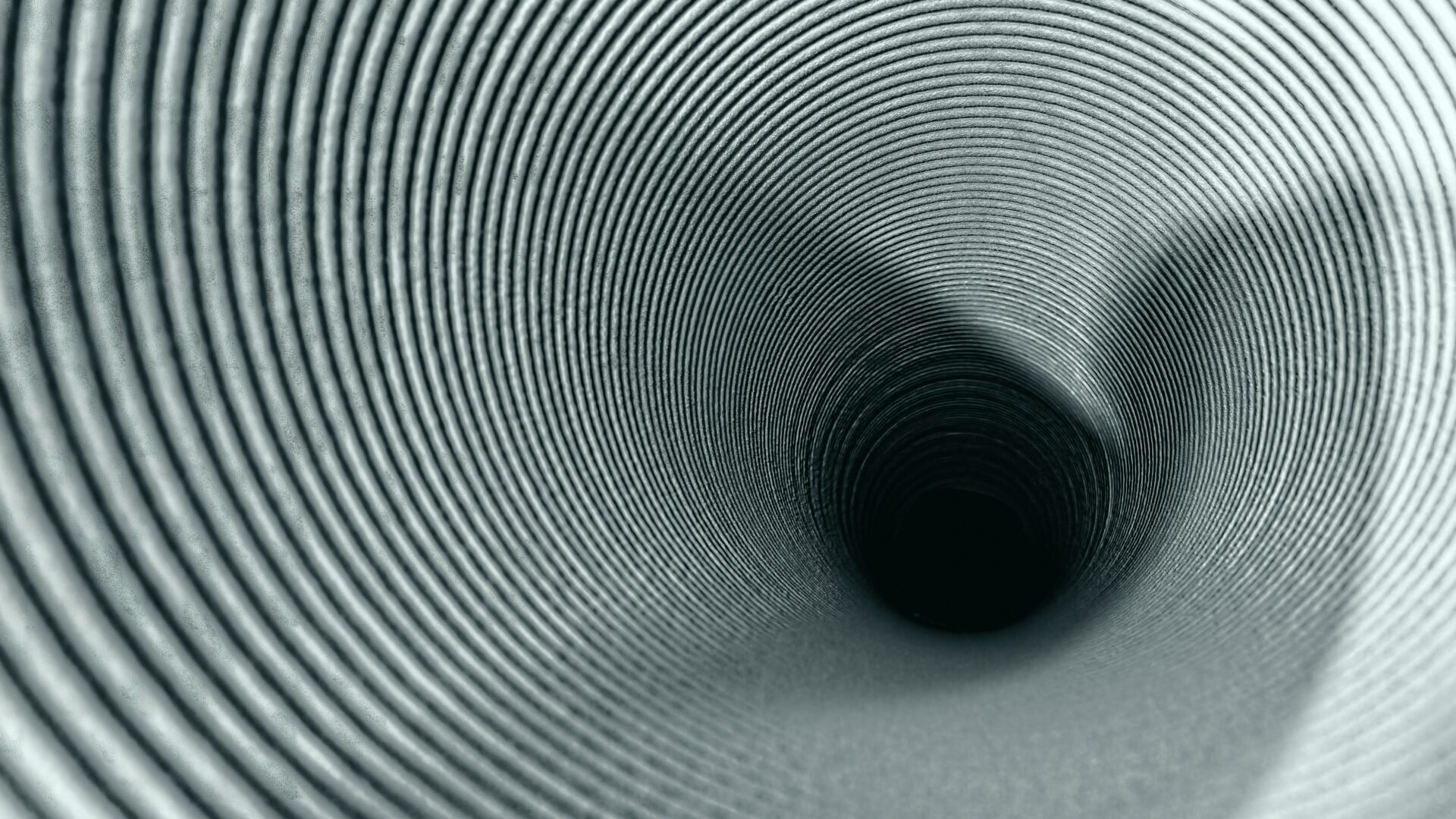 A black-and-white image of a tunnel used as a metaphor for a real estate marketing funnel.