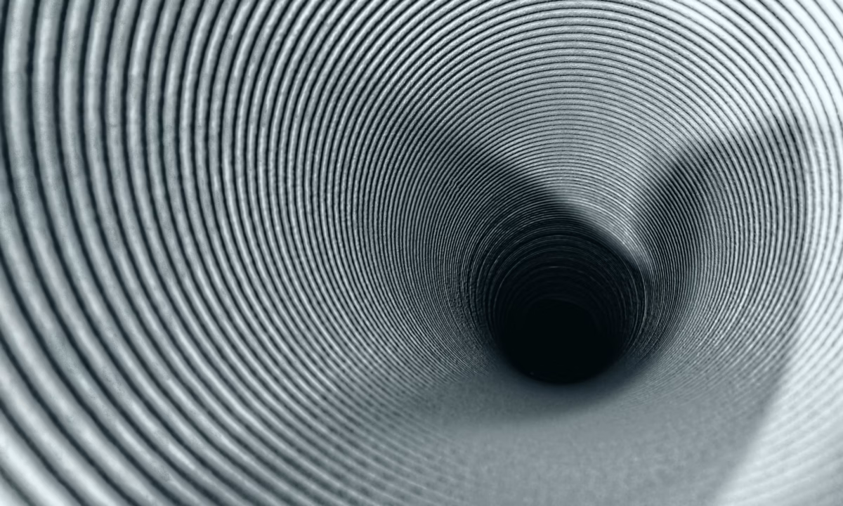A black-and-white image of a tunnel used as a metaphor for a real estate marketing funnel.