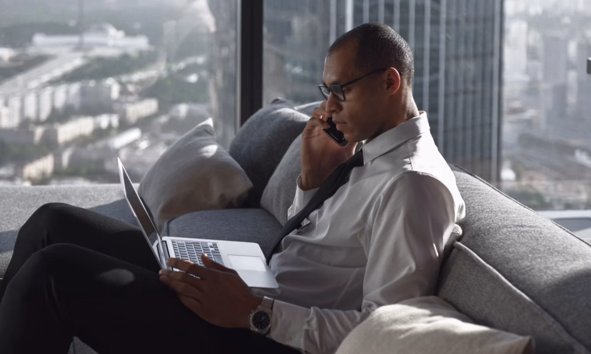 agent on phone discussing referral fee real estate