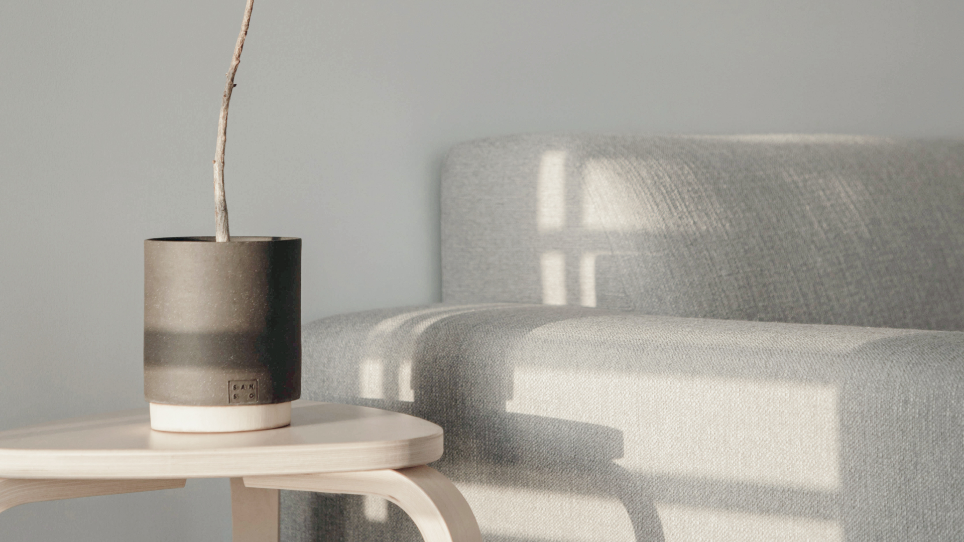 image of a sofa next to a coffee table