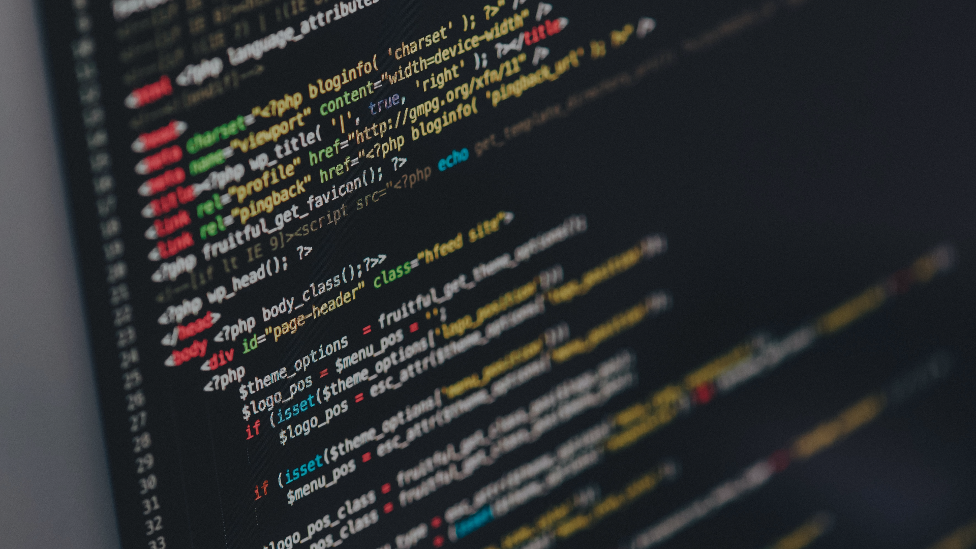 image of laptop with code on it 