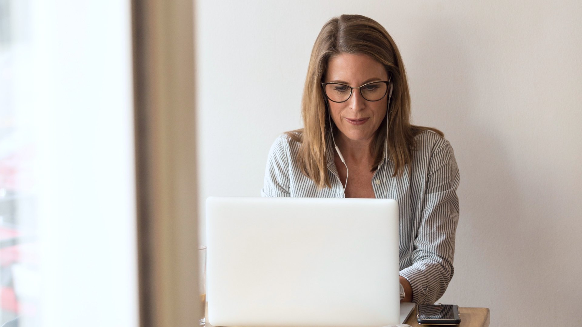 real estate agent working on laptop