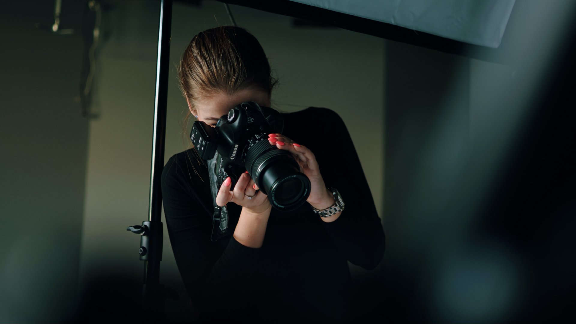 photographer taking pictures with camera