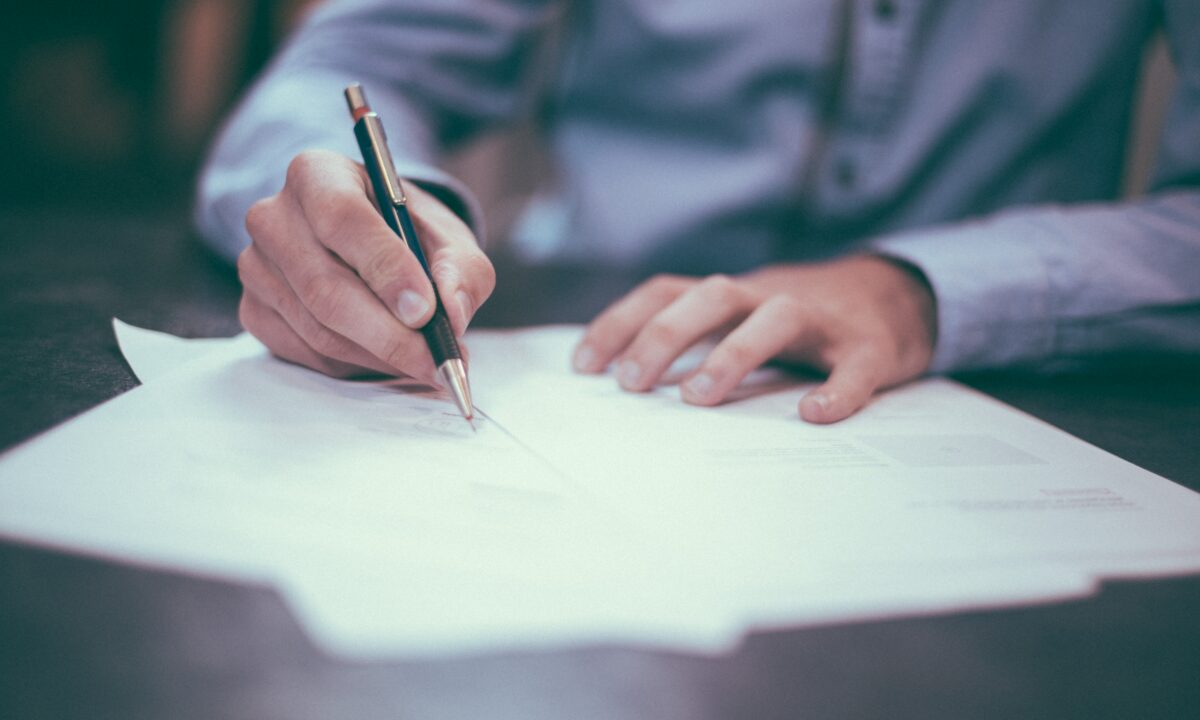 real estate agent signing contract