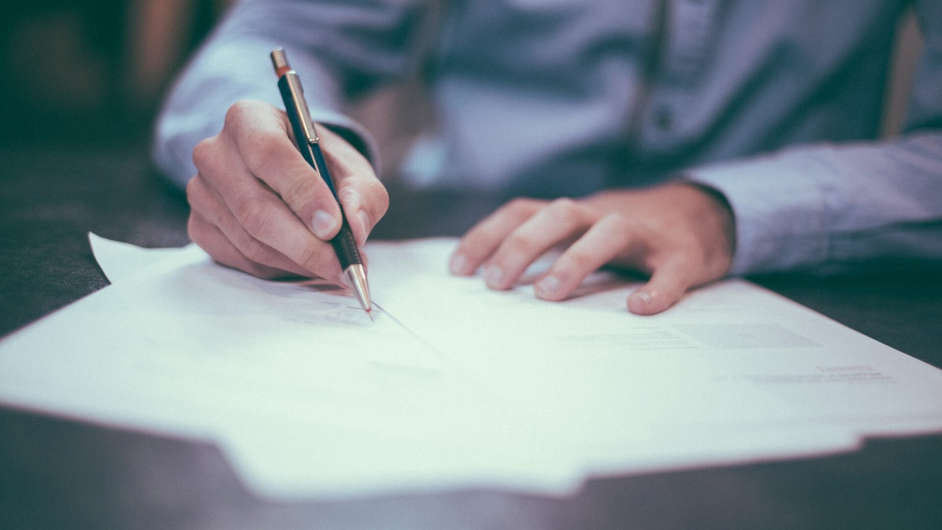 real estate agent signing contract