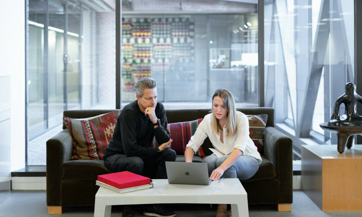 Two real estate agents working together to complete a real estate referral