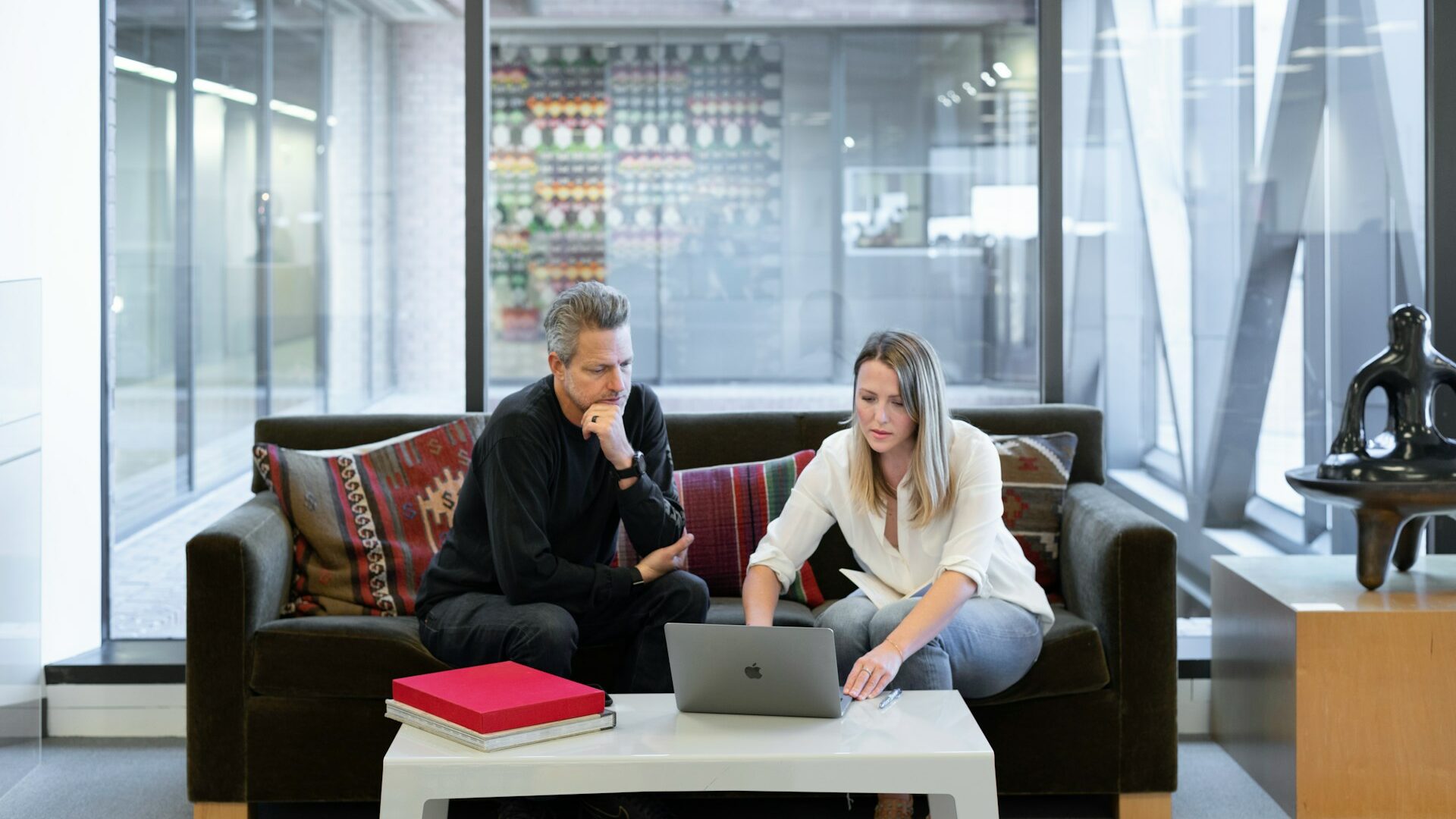 Two real estate agents working together to complete a real estate referral