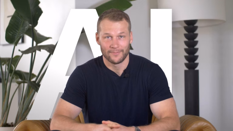 Luxury Presence founder and CEO Malte Kramer sits at a desk in front of the letters "AI" superimposed on the background