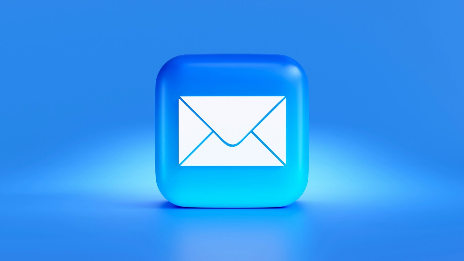 Blue icon featuring an envelope representing business strategy around real estate newsletters
