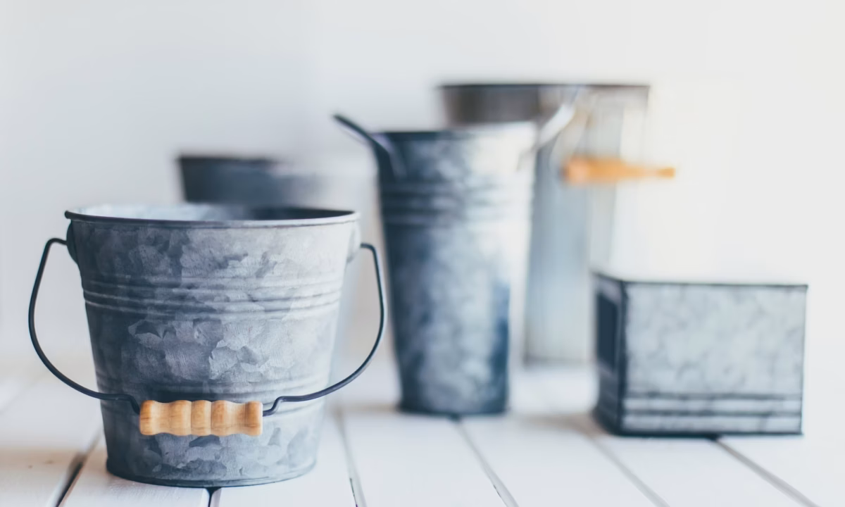 5 galvanized buckets of different shapes and sizes, representing audience segmentation techniques