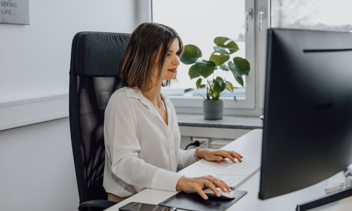 A personal assistant organizes a real estate agent email list for their brokerage marketing campaign