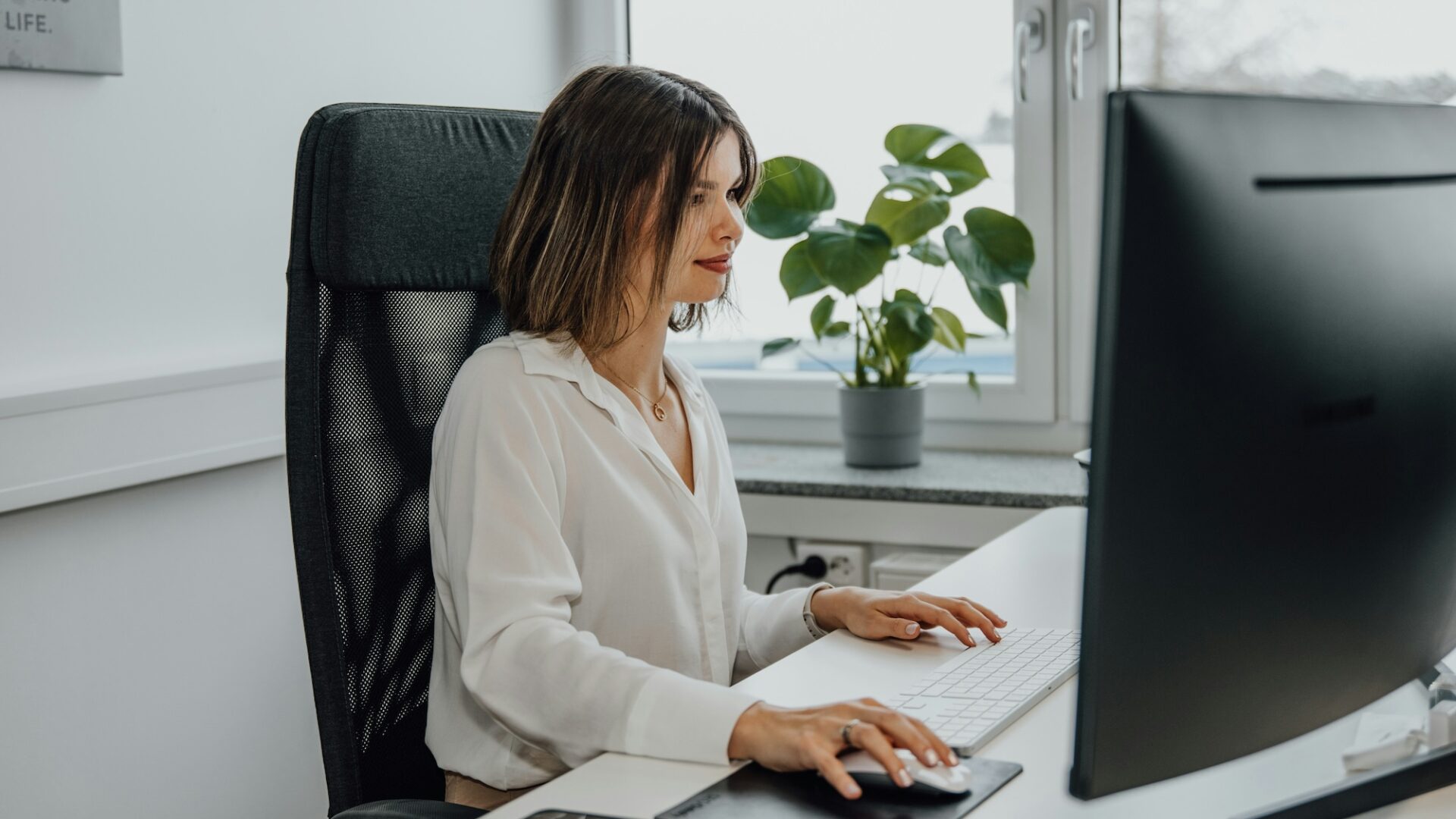 A personal assistant organizes a real estate agent email list for their brokerage marketing campaign