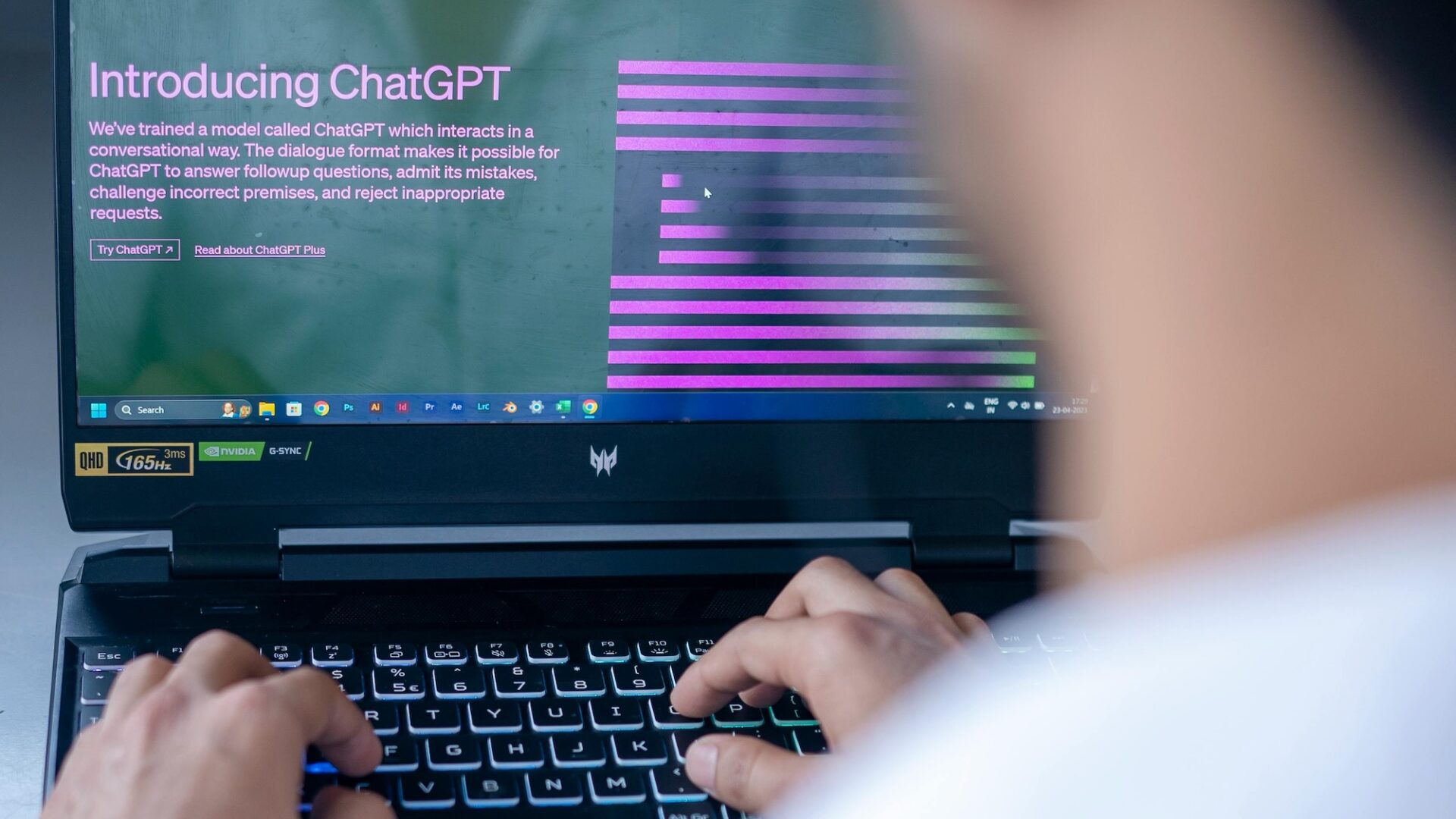 real estate agent sitting in front of a laptop using chatgpt prompts for email marketing
