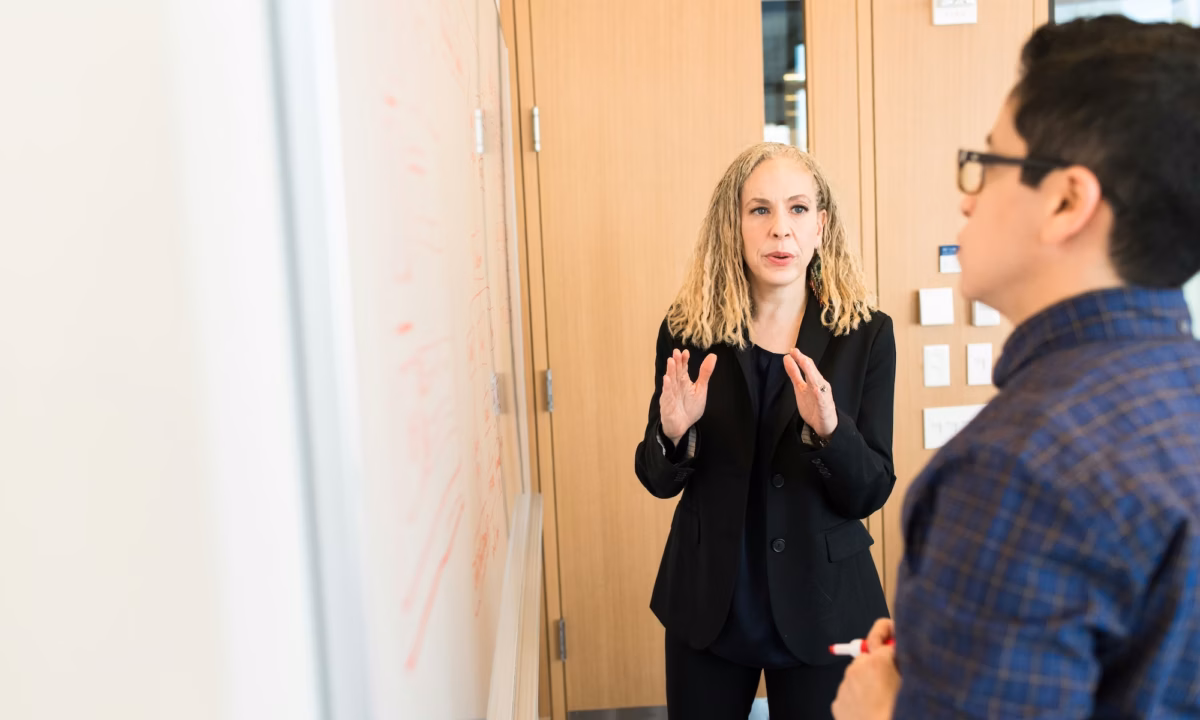 An engineer explains to a real estate agent to how implement email marketing automation in client nurture sequences