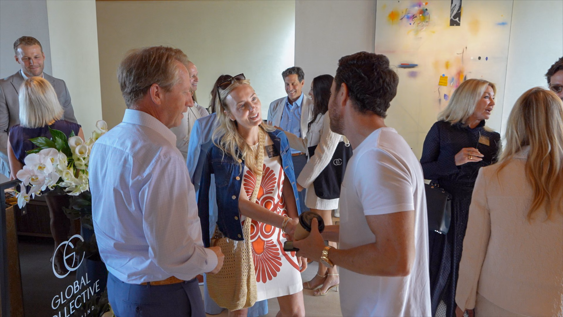 A group of luxury real estate agents at a networking event in 2024 with collective by luxury presence