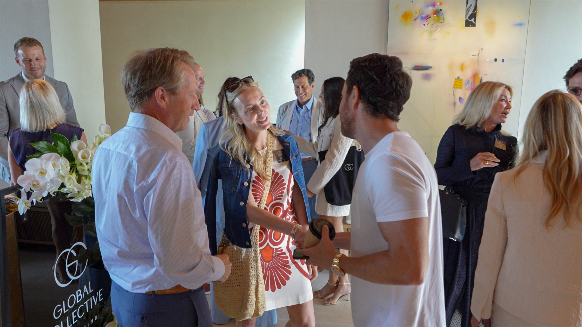 A group of luxury real estate agents at a networking event in 2024 with collective by luxury presence