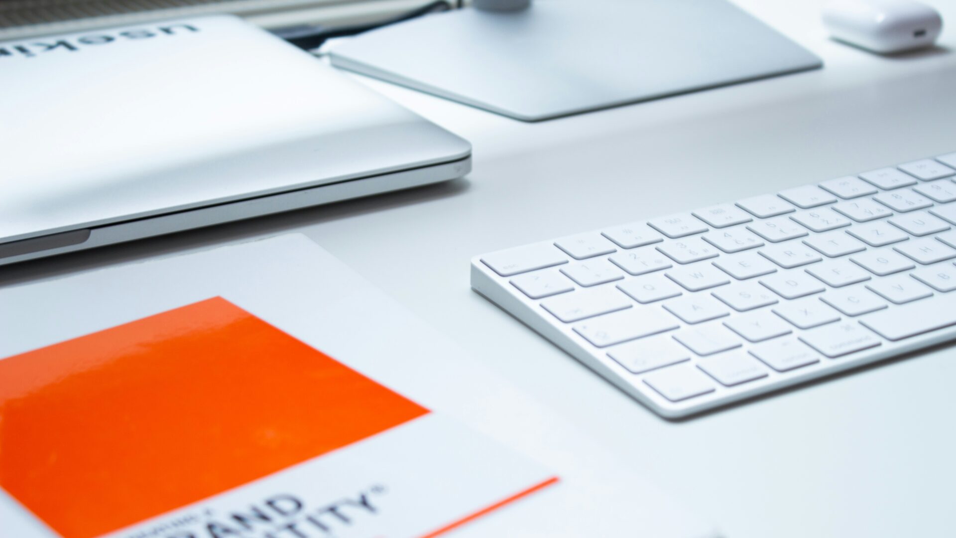 Tools needed for analyzing brand logos and market data to conduct a competitive brand analysis