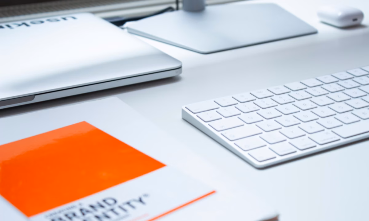 Tools needed for analyzing brand logos and market data to conduct a competitive brand analysis