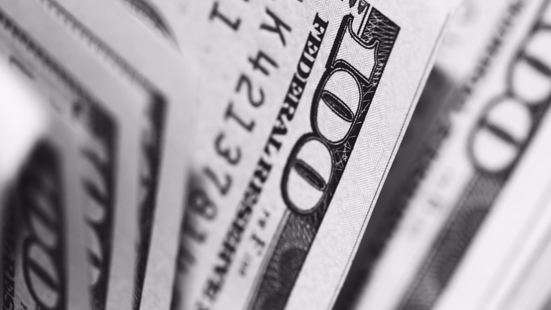 close up image of a hundred-dollar bills that illustrate a marketing ROI