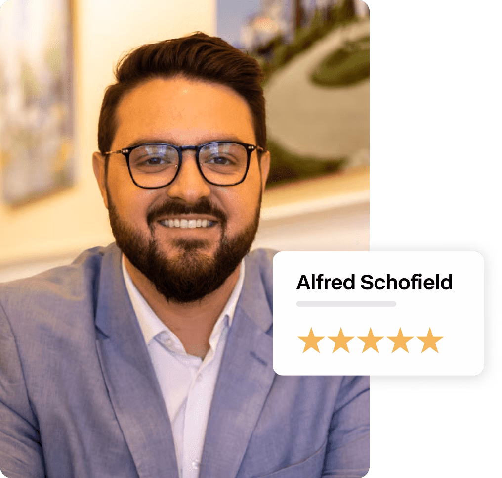 A headshot of Alfred Schofield of the Guthrie Schofield Group with a badge in front showing five stars under his name