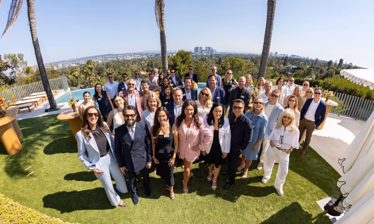 A group shot of attendees at the collective mastermind 2025