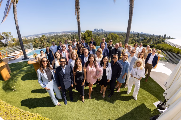 A group shot of attendees at the collective mastermind 2025