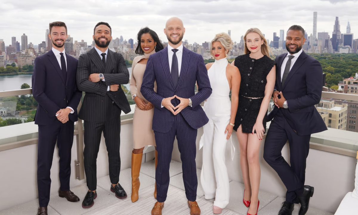 The Nile Lundgren team poses at the top of a building in New York City