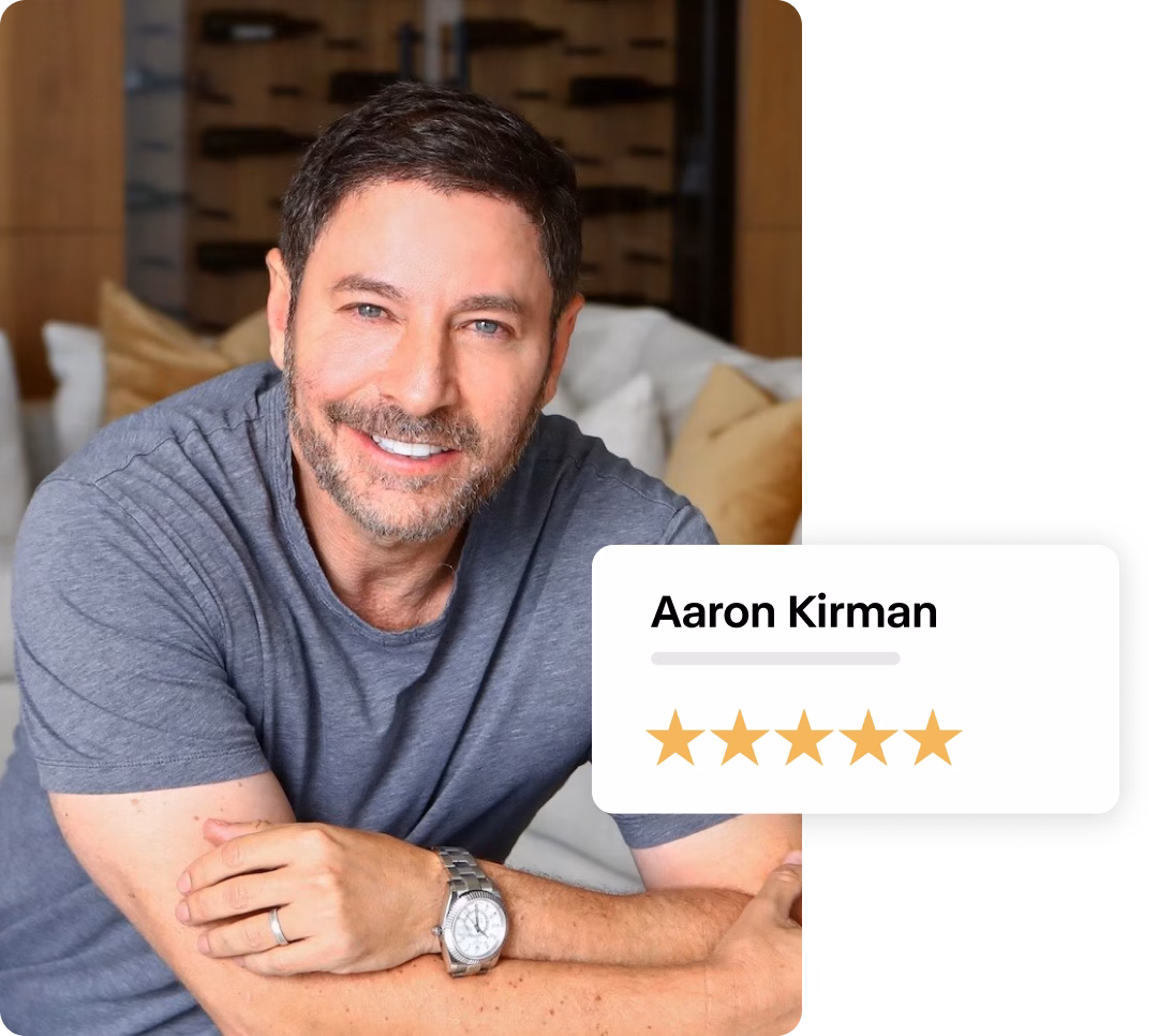 Headshot of real estate broker Aaron Kirman with a five-star rating over the top